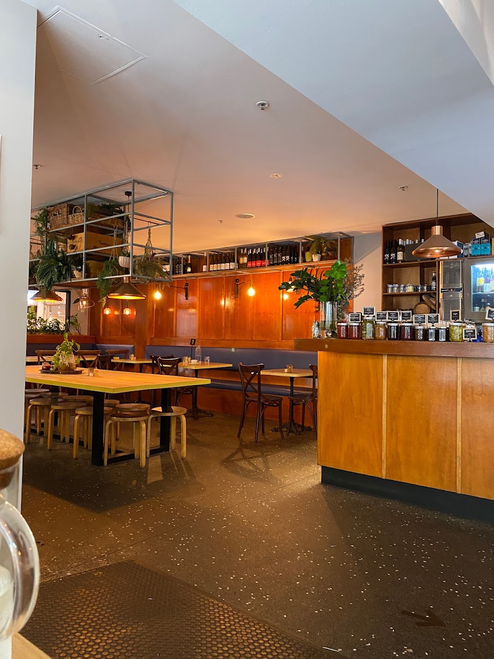 Warm interior dining space at The Fine Food Store